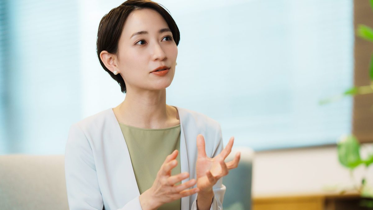 A woman talking with hand gestures