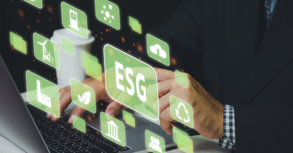 Text and icons related to ESG alongside someone operating a computer