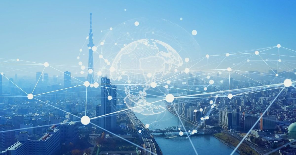 日本の都市風景とデジタルネットワークを表す図